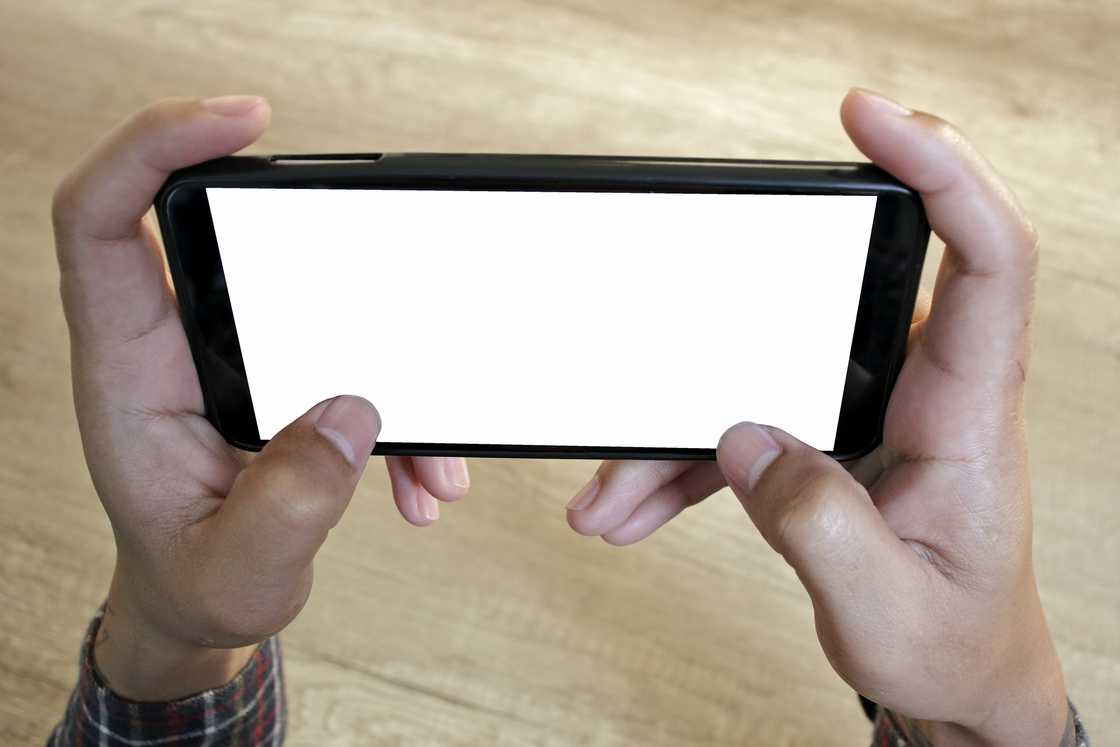 A man is recording a video with his phone A man is recording a video with his phone