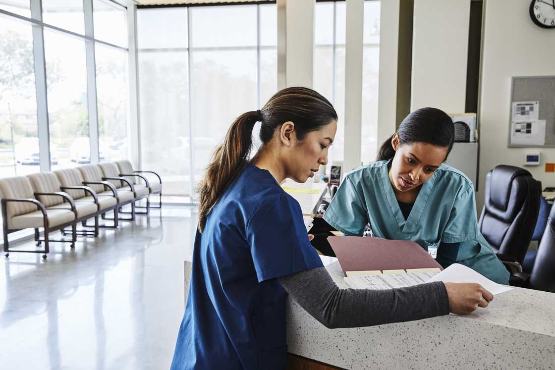 Nurses working at the reception desk