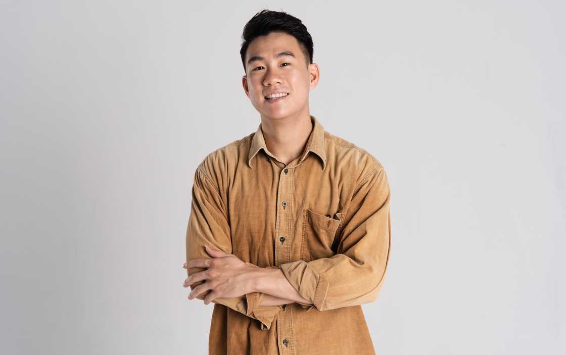 a man in brown shirt