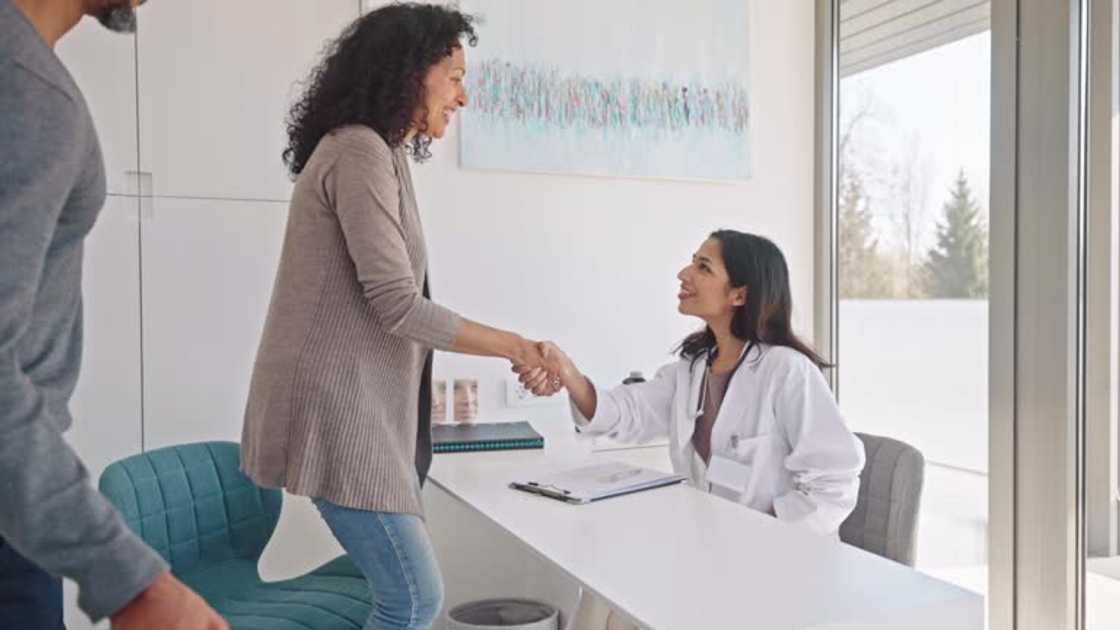 A married couple on a doctor's appointment A married couple on a doctor's appointment