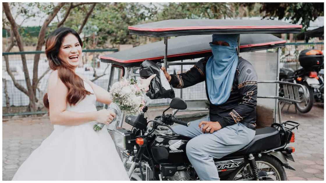 Bride na tumanggap ng parcel sa gitna ng wedding photoshoot, kinagiliwan online Bride na tumanggap ng parcel sa gitna ng wedding photoshoot, kinagiliwan online