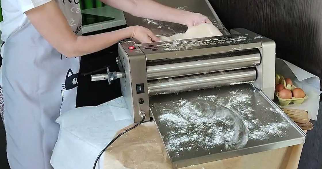 Woman's arm gets stuck in dough roller machine in Navotas Woman's arm gets stuck in dough roller machine in Navotas