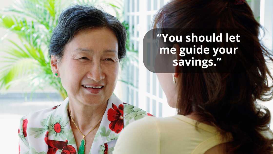 A mother and daughter having a conversation A mother and daughter having a conversation