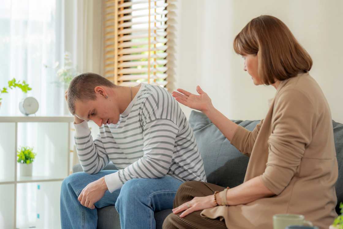 Mother arguing with her son Mother arguing with her son