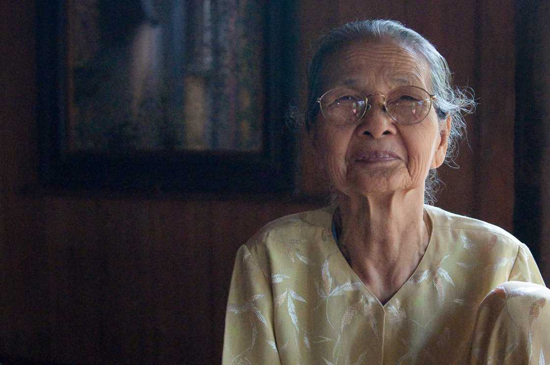 Filipino grandmother observing