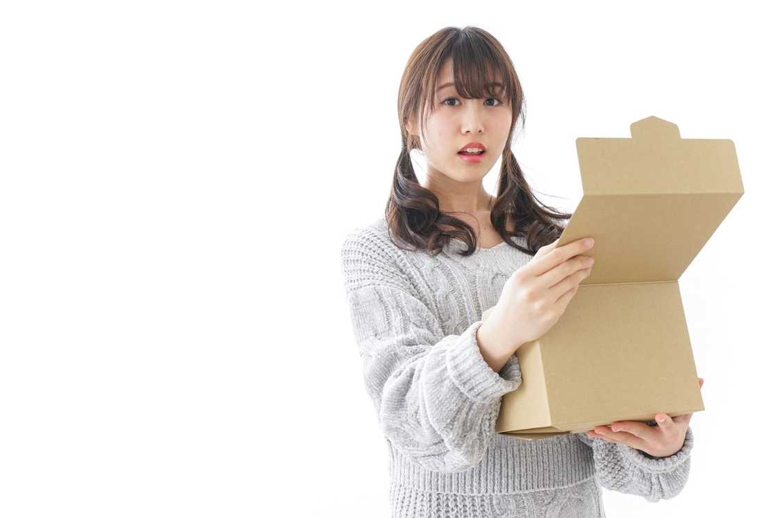 A girl is having a box