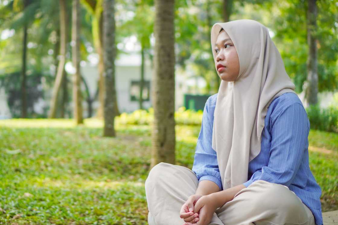 Reflective young muslim girl Reflective young muslim girl