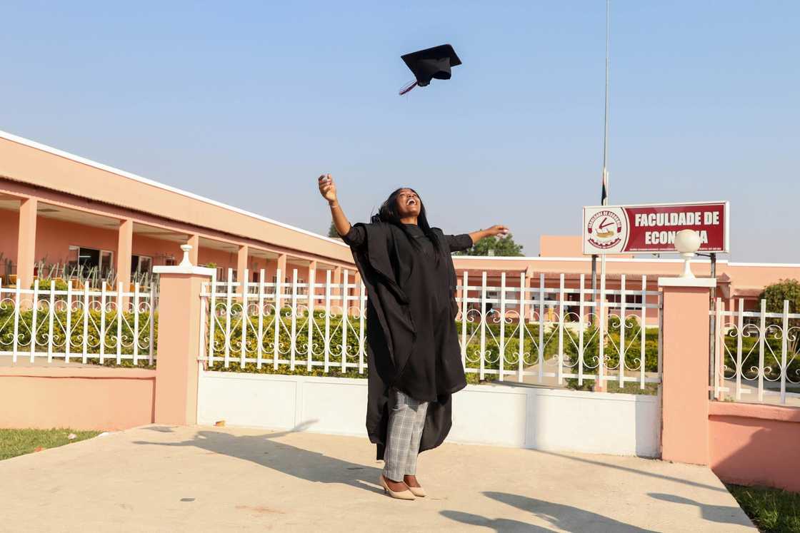 A female graduate A female graduate