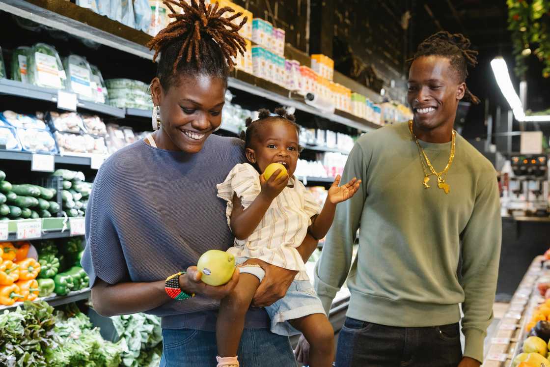 A mother, father, and daughter A mother, father, and daughter