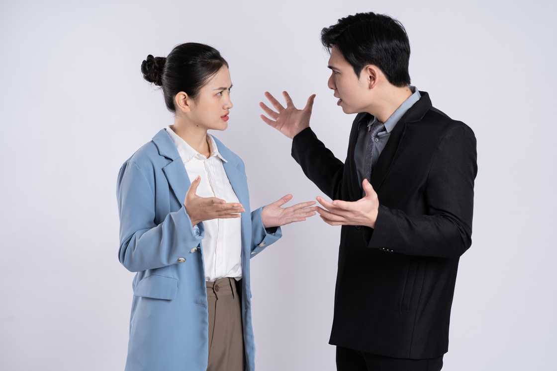 Asian man and woman arguing Asian man and woman arguing