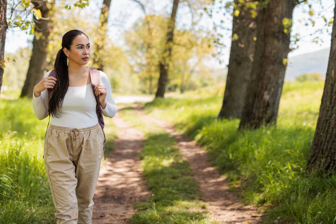 A lady is hiking A lady is hiking