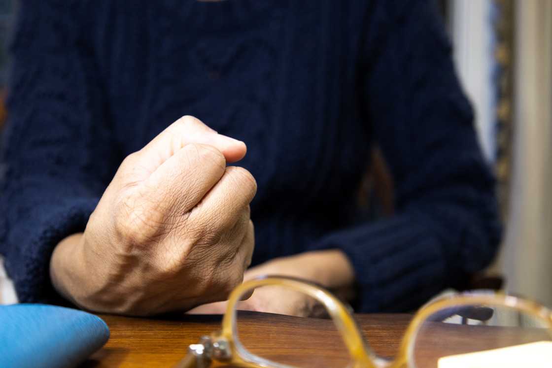 angry woman slamming her hand on the table angry woman slamming her hand on the table