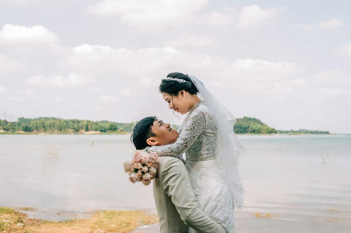 A happy couple on their wedding day A happy couple on their wedding day