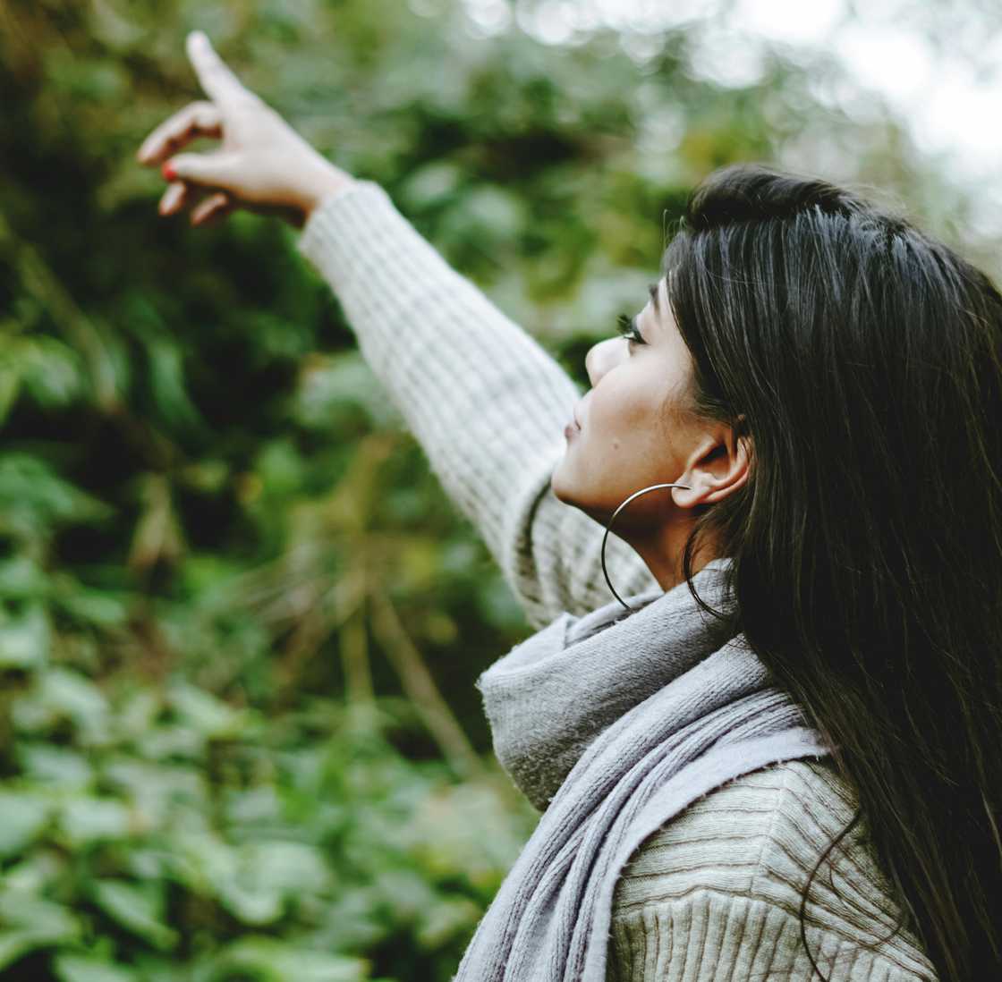 A woman pointing with her finger