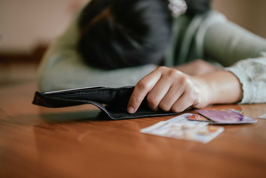 A woamn who is dissapointed with her savings