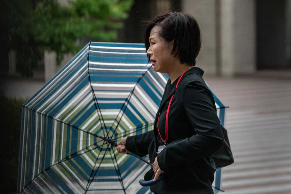 Schoolgirl crying profusely Schoolgirl crying profusely