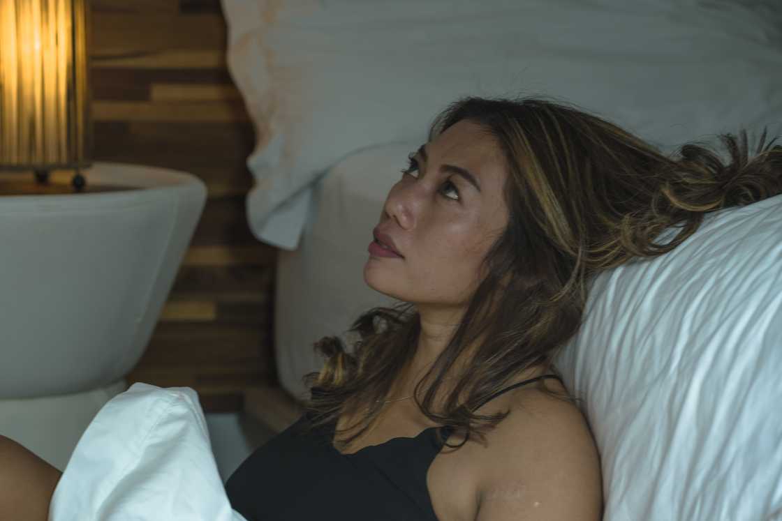 A lady in her bedroom