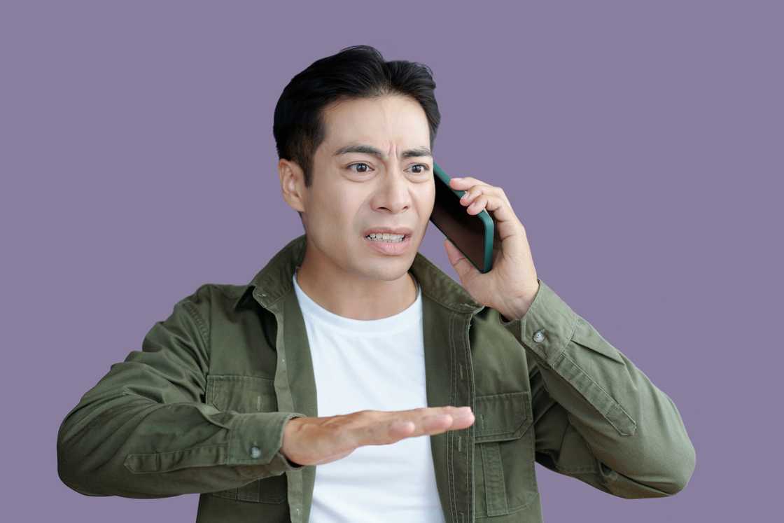 A man asking for help over the phone A man asking for help over the phone