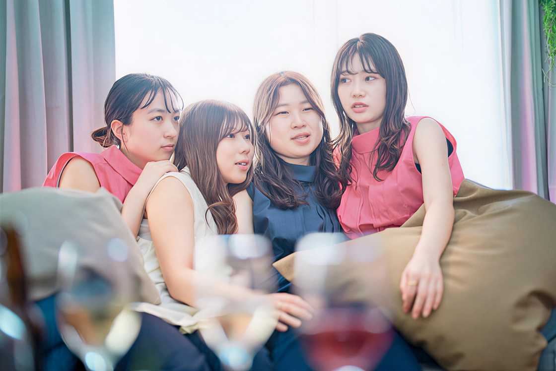 Four young women are relaxing Four young women are relaxing