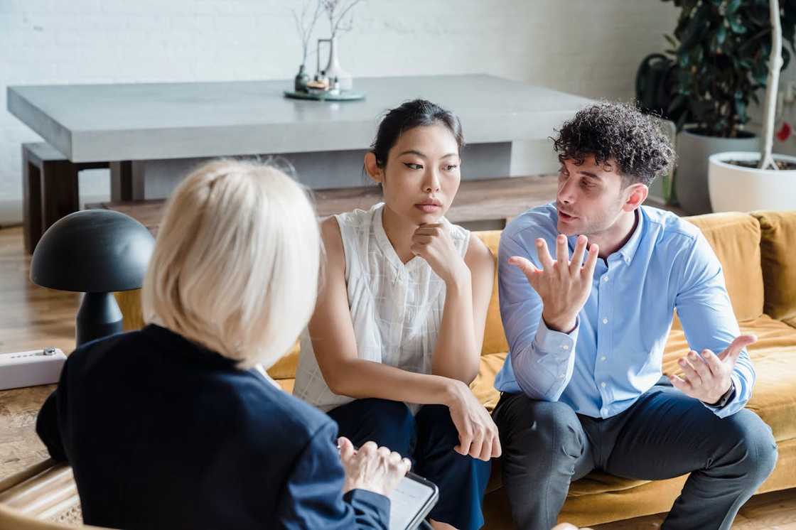A couple during a family counselling session. A couple during a family counselling session.