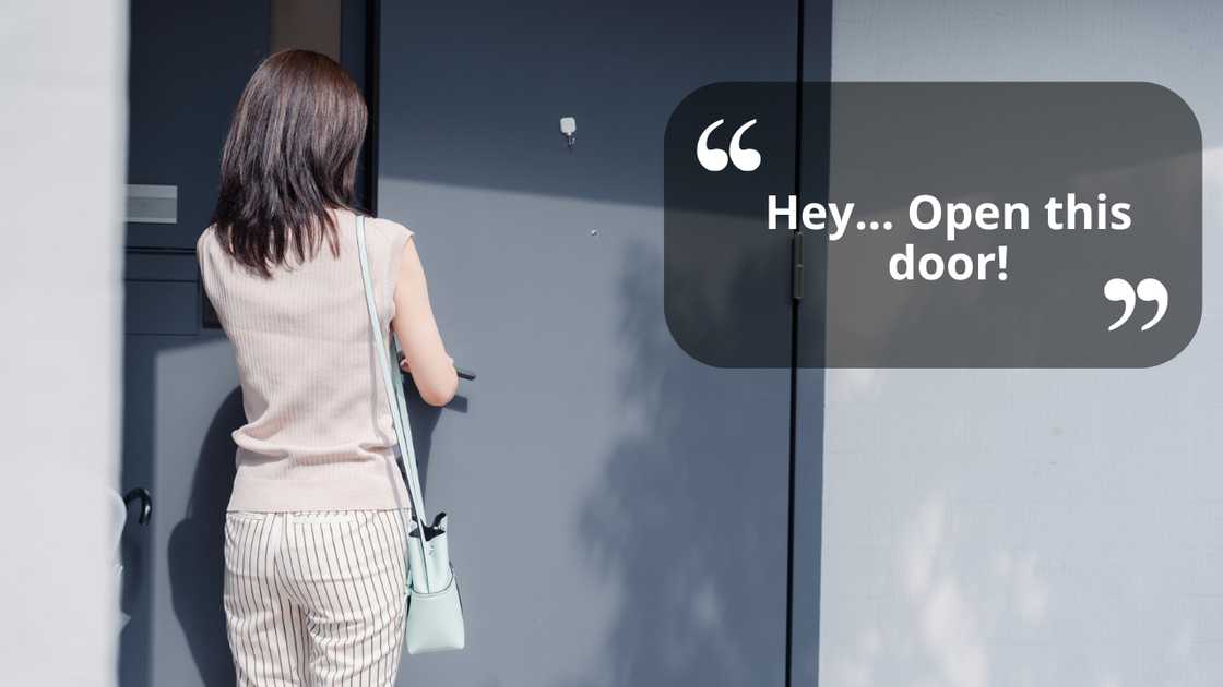 A woman opening a door A woman opening a door