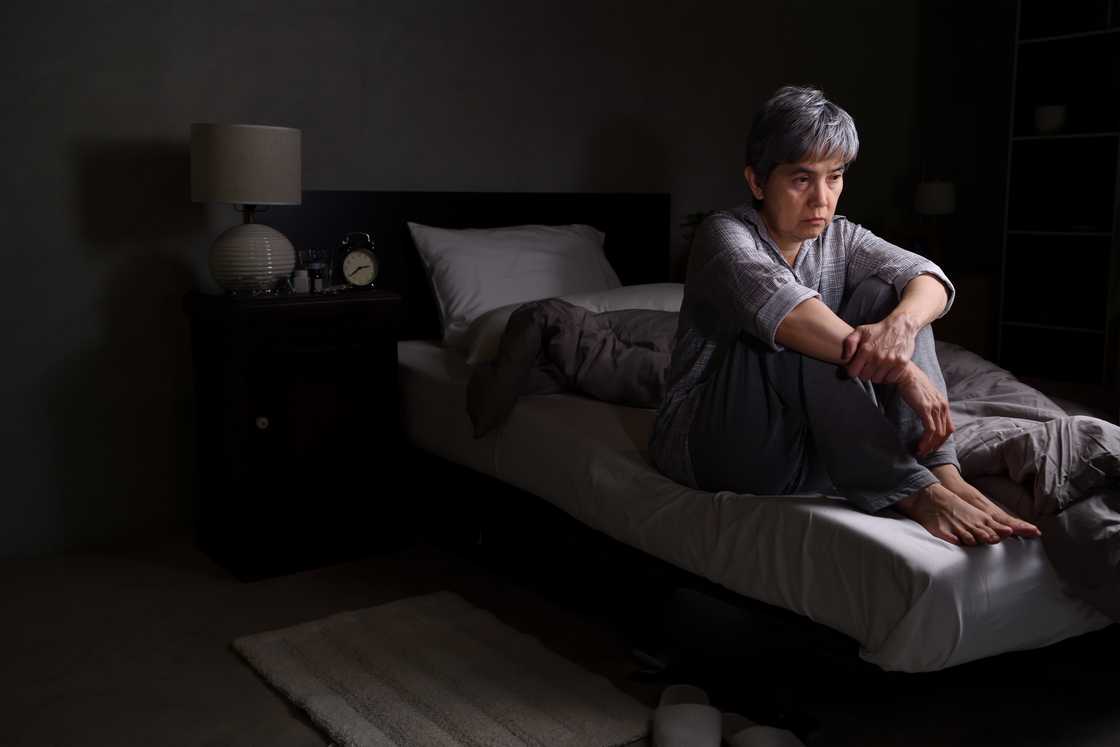 A stressed woman at night A stressed woman at night