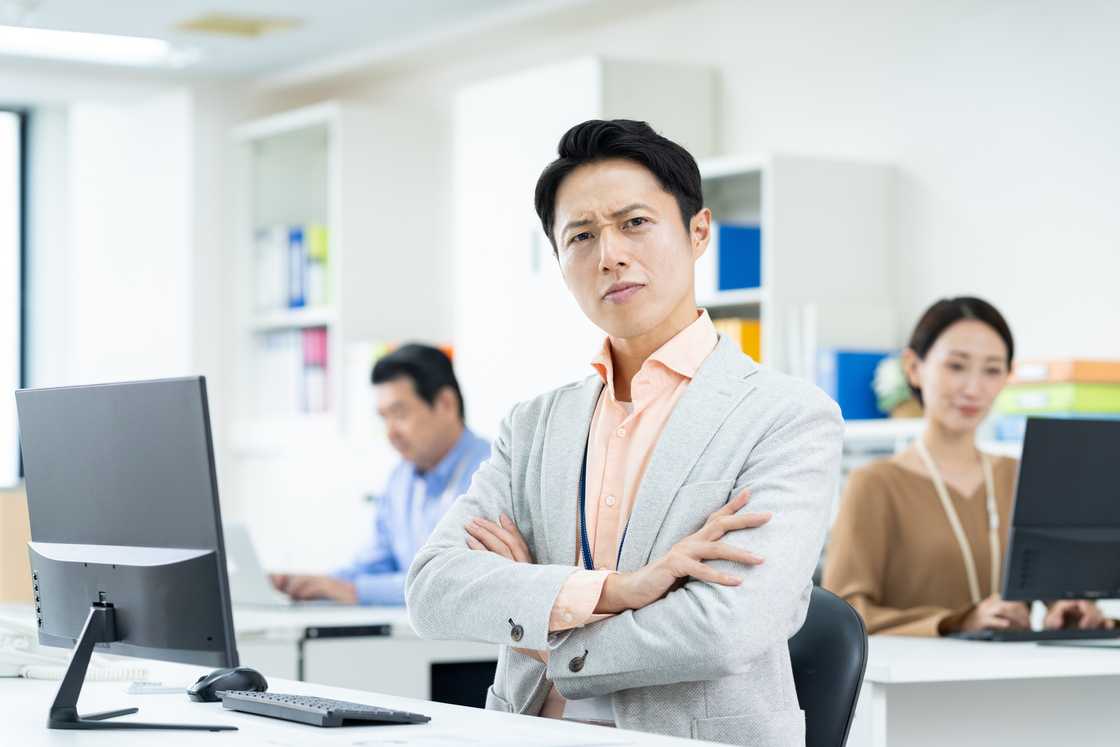 An unhappy boss in office An unhappy boss in office