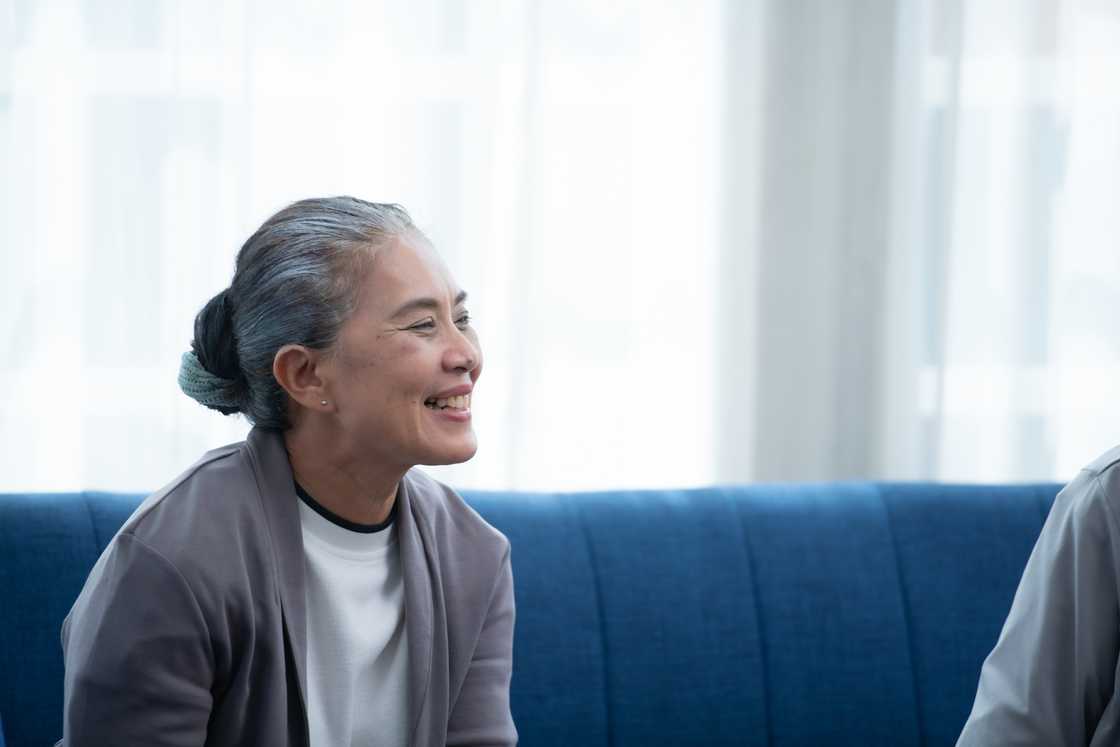 A woman having a conversation at home
