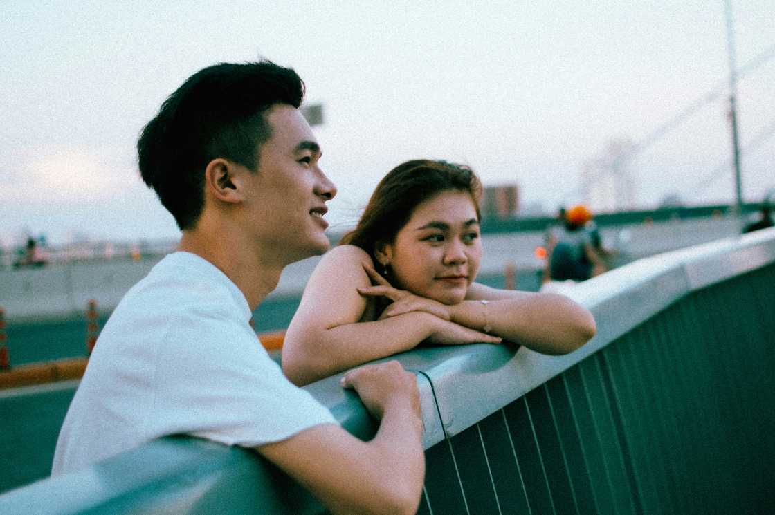 A young couple talking outdoors A young couple talking outdoors