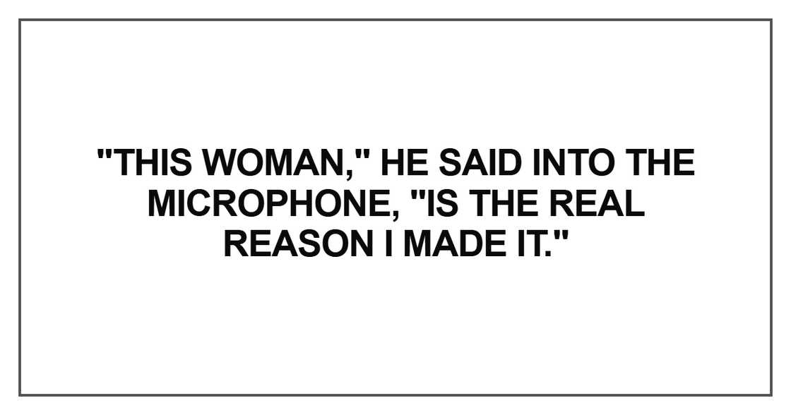 This woman," he said into the microphone This woman," he said into the microphone