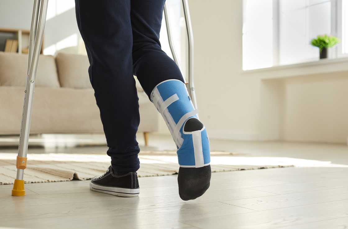 A man with a leg cast A man with a leg cast