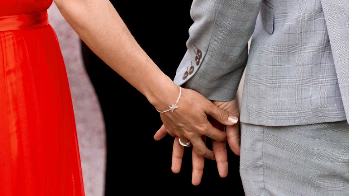 A couple holding hands