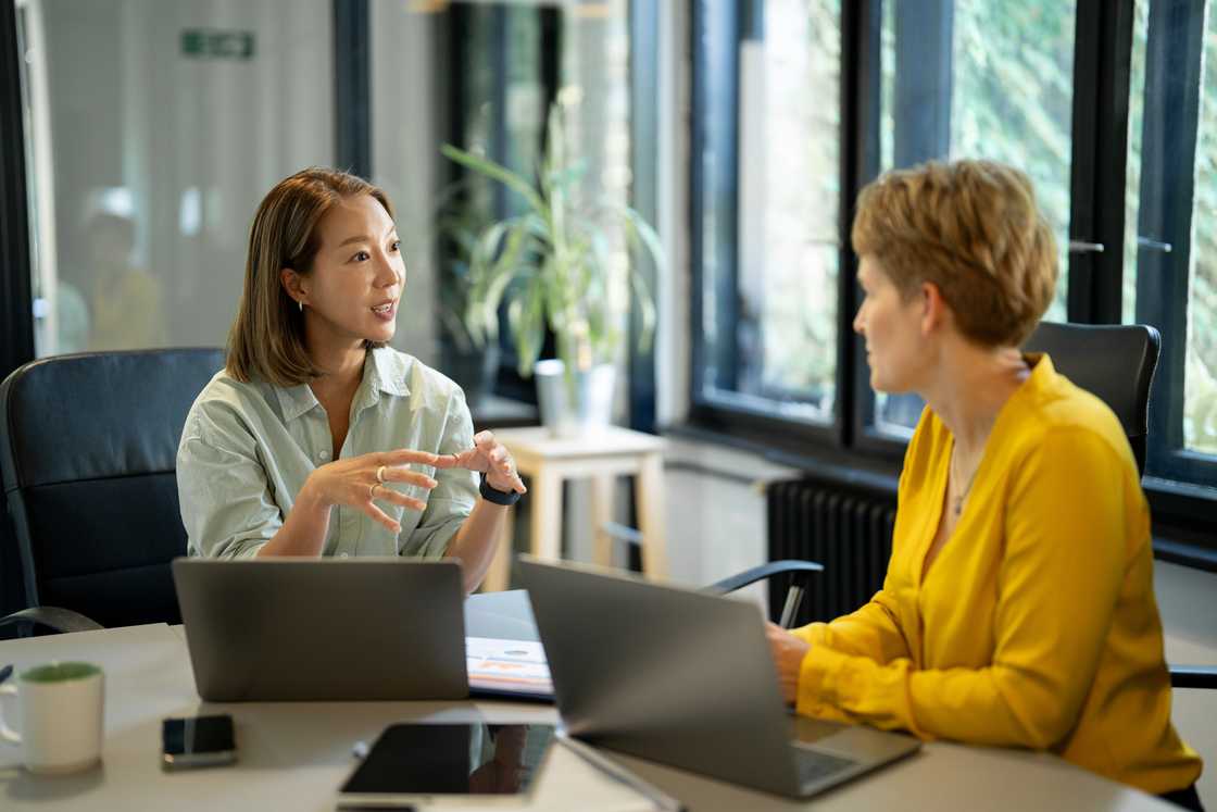 Two women are in the office
