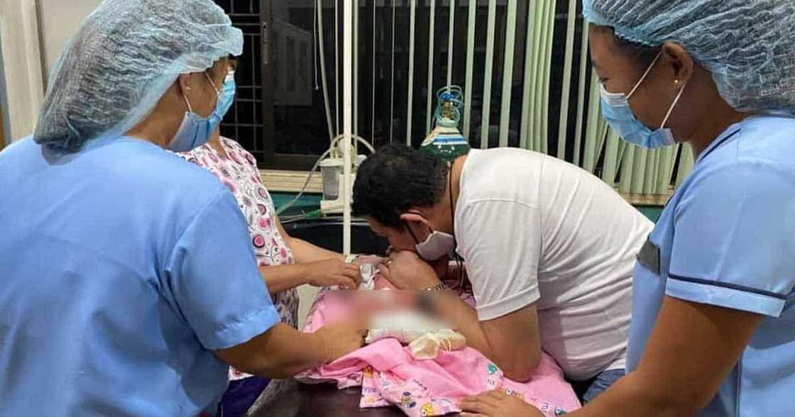 Baby born not breathing, saved after doc does CPR for 30 minutes Baby born not breathing, saved after doc does CPR for 30 minutes