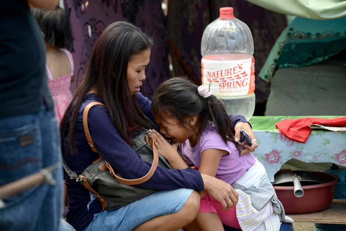 Daughter cries to her mother. Daughter cries to her mother.