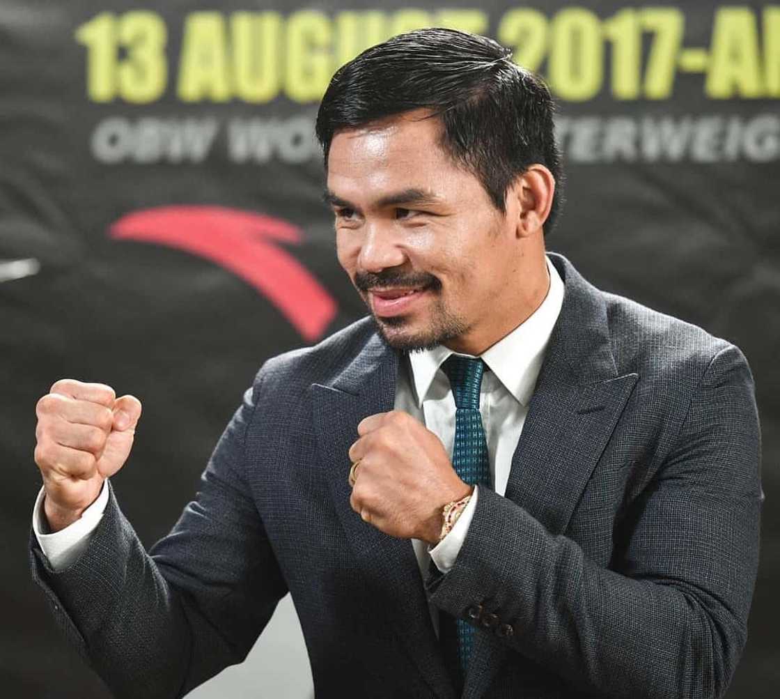 how old is Manny Pacquiao