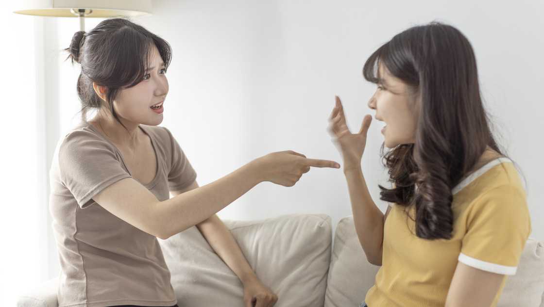 Two ladies are arguing