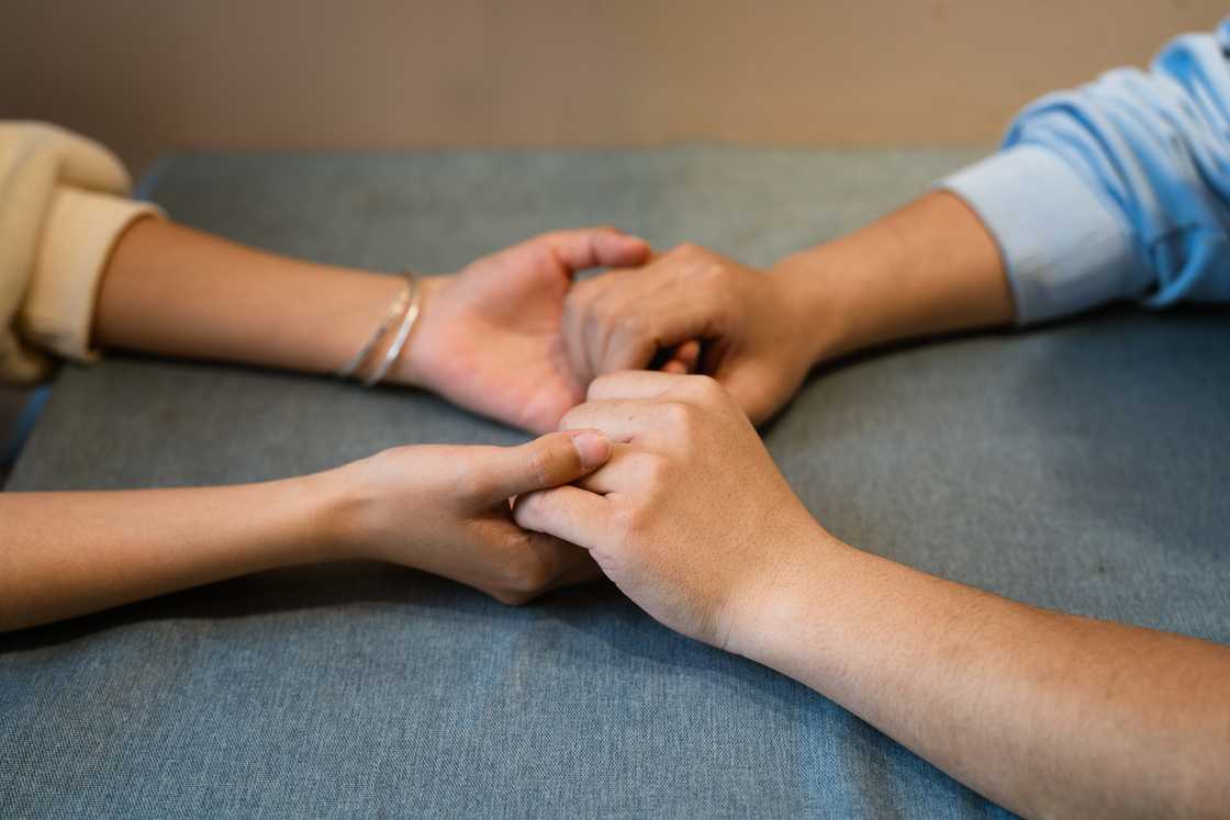 A couple holding hands A couple holding hands
