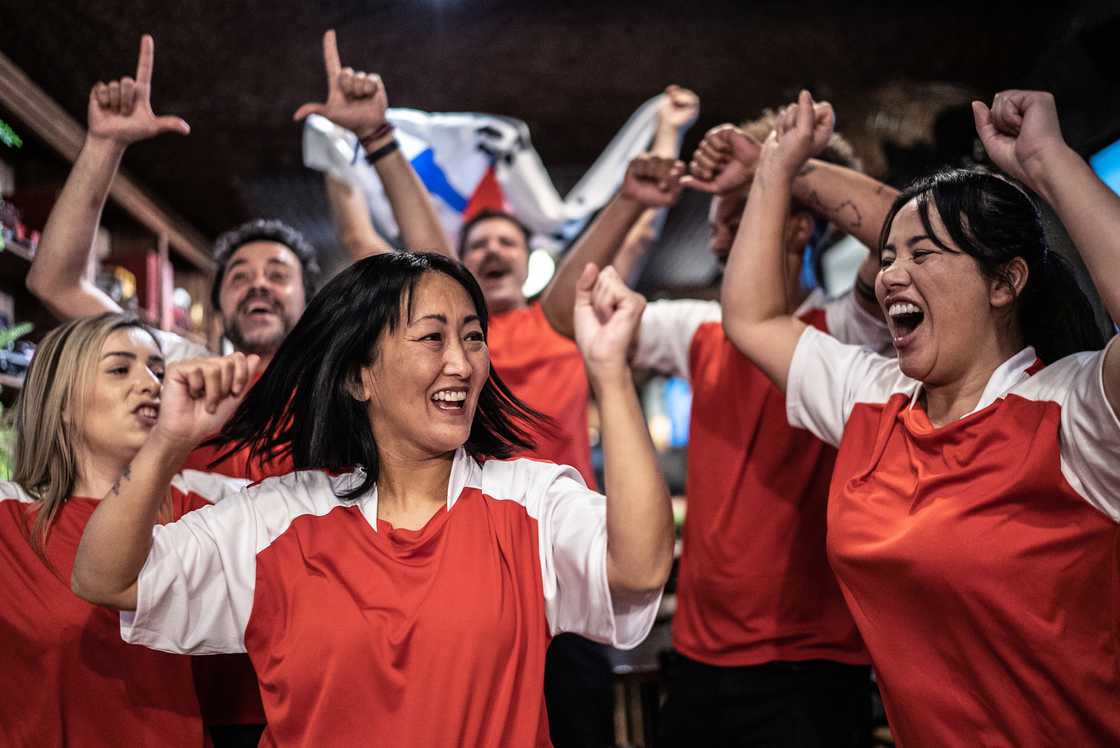 A woman celebrating a goal A woman celebrating a goal