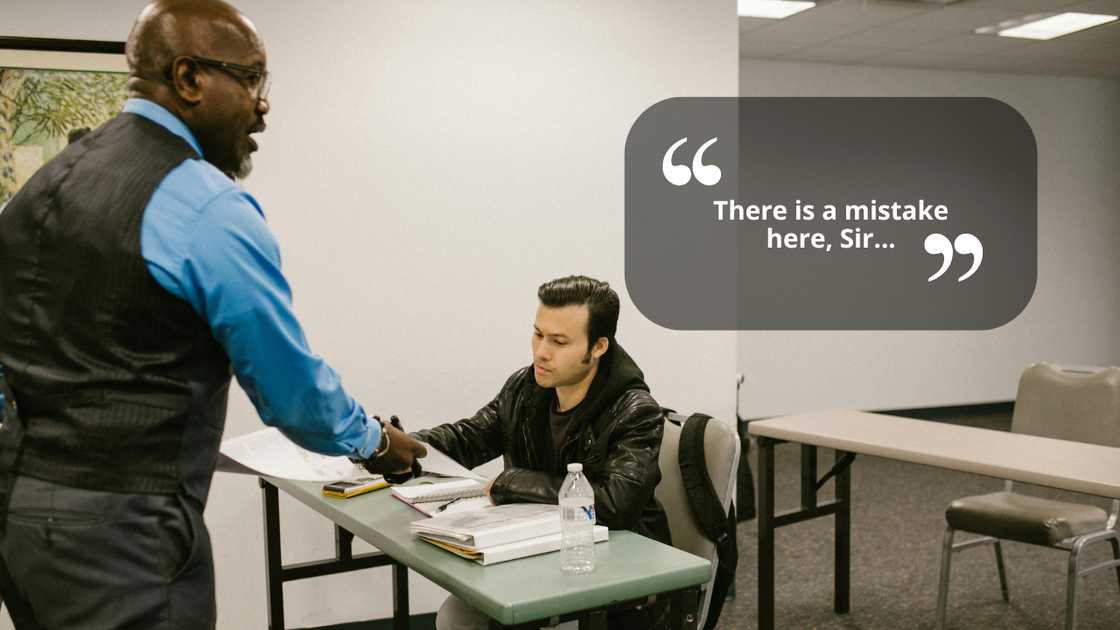 Teacher and student discussing exam results Teacher and student discussing exam results