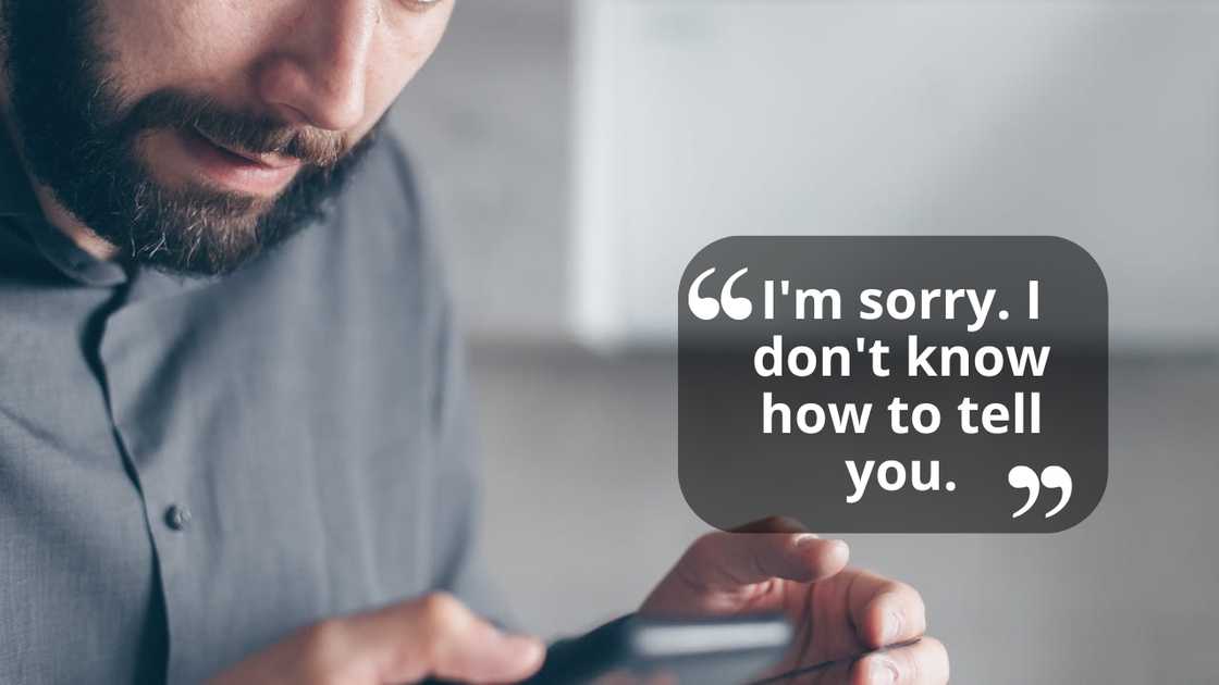 A man stares at his phone with a worried expression. A man stares at his phone with a worried expression.