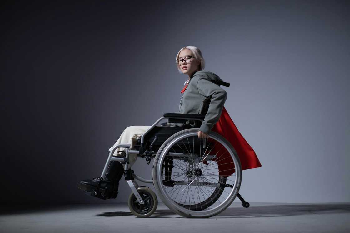 A girl in a wheelchair A girl in a wheelchair