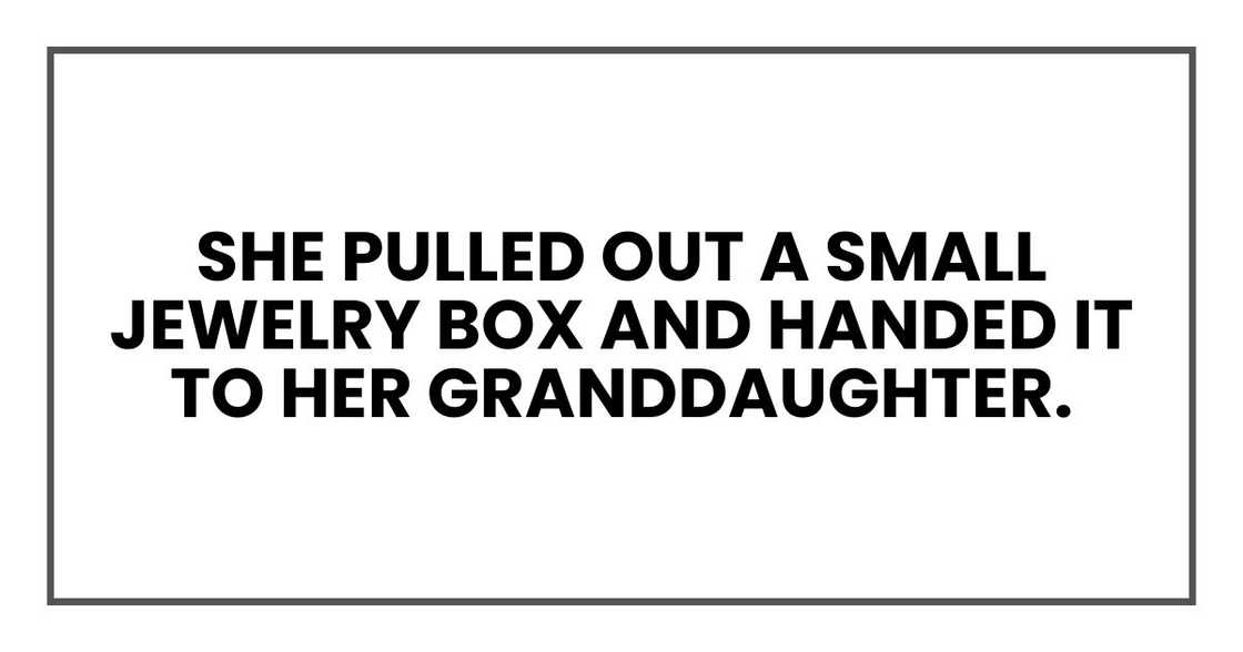 She pulled out a small jewelry box and handed it to her granddaughter. She pulled out a small jewelry box and handed it to her granddaughter.