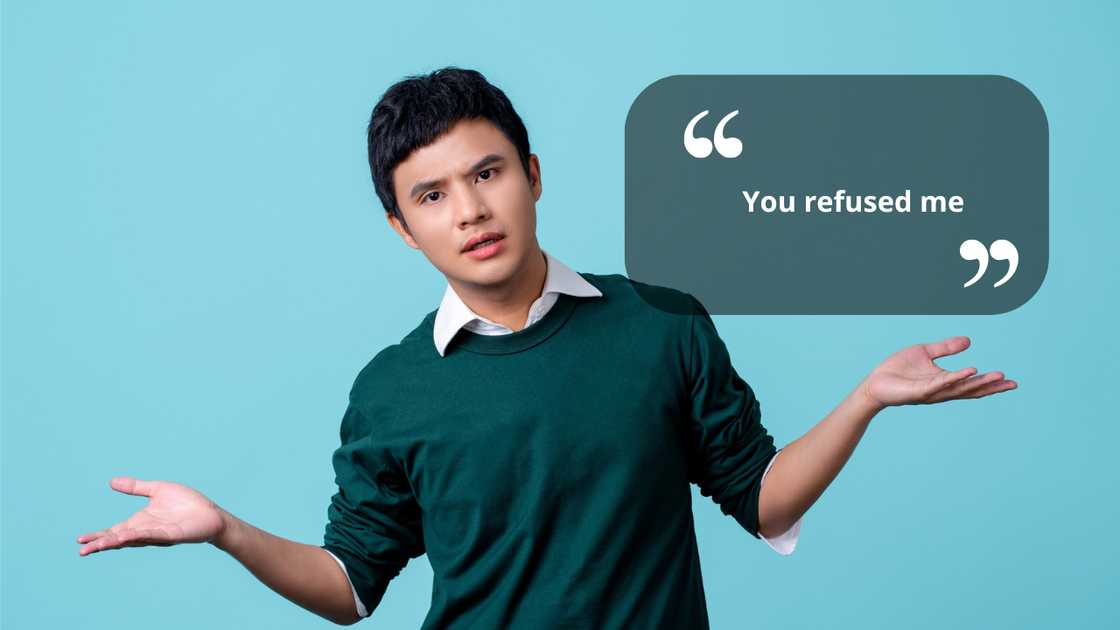 A young man shrugging his shoulders A young man shrugging his shoulders