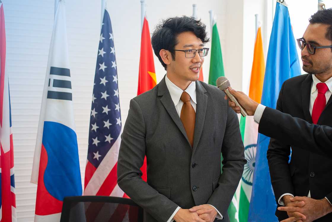 A man talk to reporters A man talk to reporters