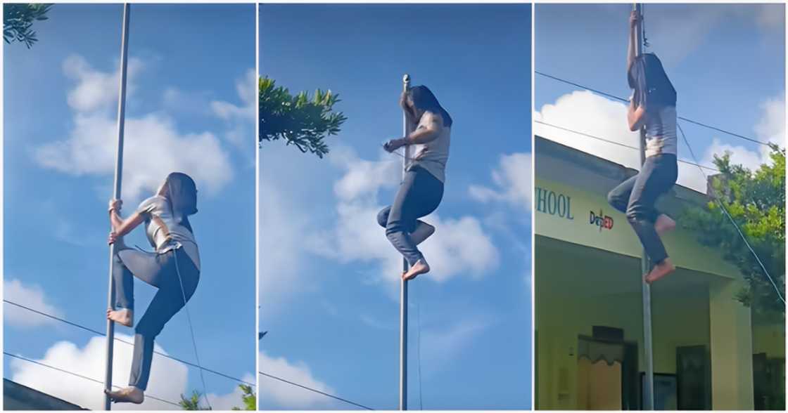 Titser, kinabiliban sa ginawa nitong pag-akyat sa flagpole upang ikabit ang rope Titser, kinabiliban sa ginawa nitong pag-akyat sa flagpole upang ikabit ang rope