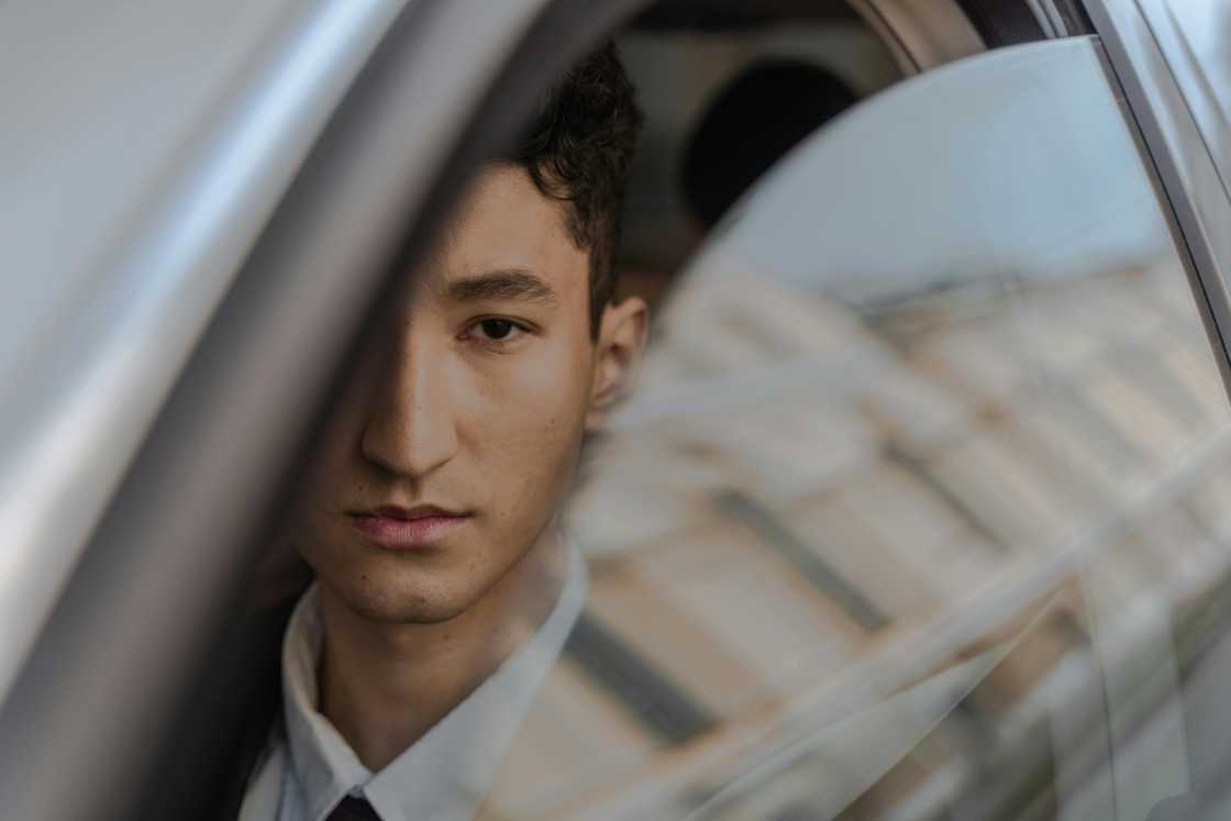 A thoughtful man in his car A thoughtful man in his car