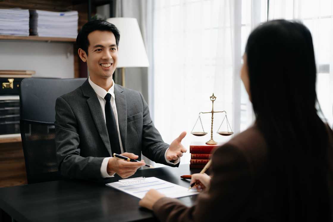 A lady at a lawyer's office. A lady at a lawyer's office.