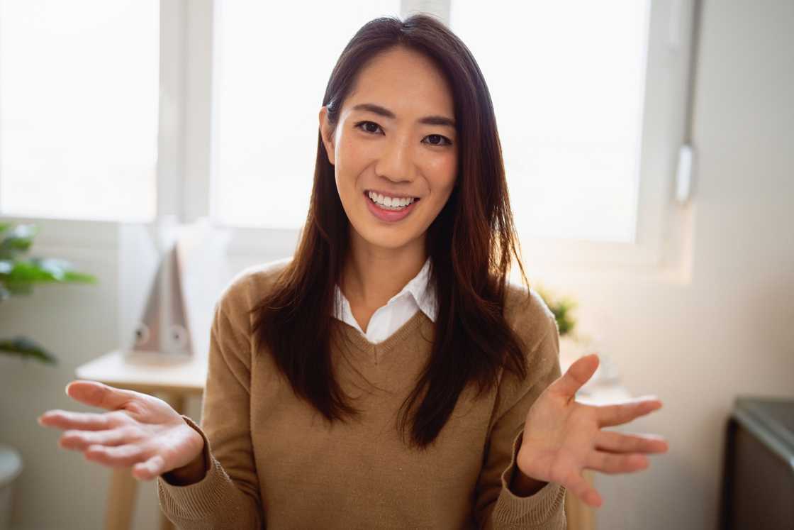 A businesswoman talking while at her office.