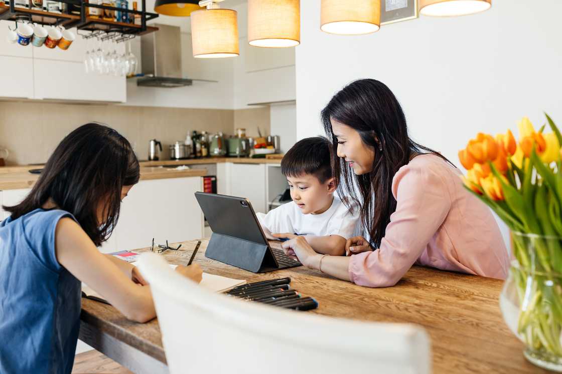 A lady and her kids A lady and her kids